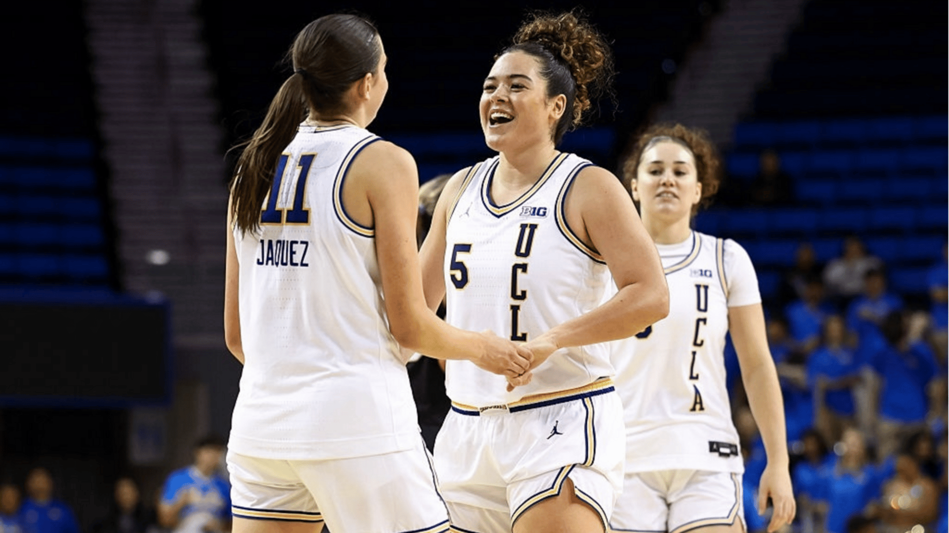 Gabriela Jaquez #11 and Charlisse Leger-Walker #5 of the UCLA Bruins celebrate a play in the second half against the Purdue Boilermakers