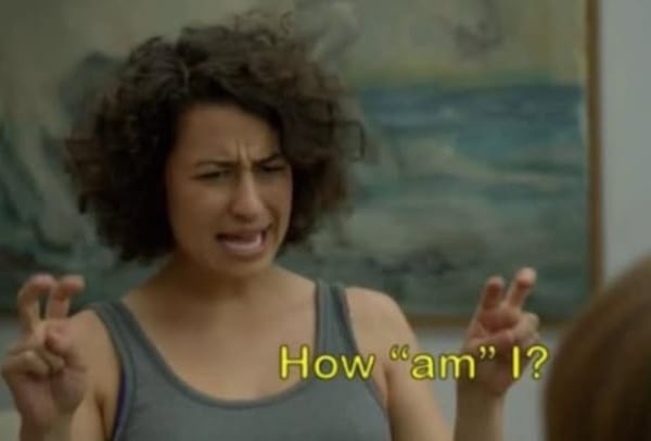 Woman giving air quotes with caption ‘How “AM” I?’