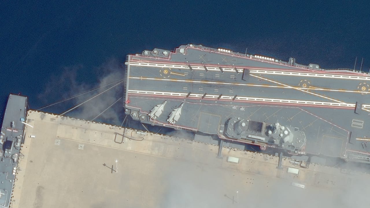 High-resolution satellite imagery of China's PLAN Aircraft carrier Shandong.
