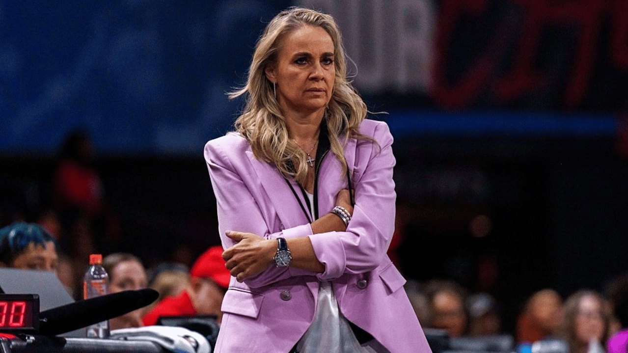 Head coach Becky Hammon of Las Vegas Aces watches the game from the sideline during a game between the Las Vegas Aces and Atlanta Dream 