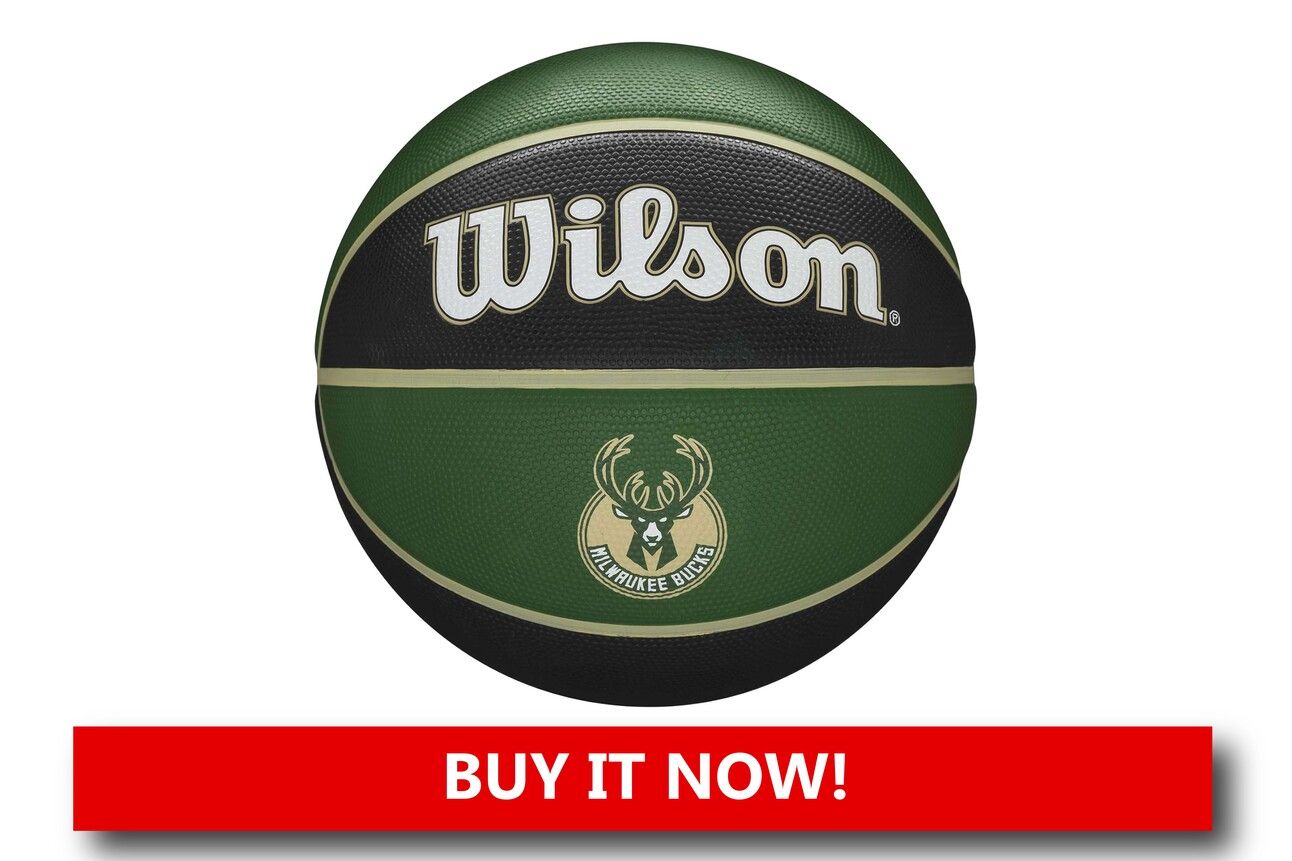  Wilson Milwaukee Bucks Logo Basketball A full-size Wilson basketball with the Bucks stag logo printed prominently in green and cream, shown with textured grip detail and positioned for either display or play.