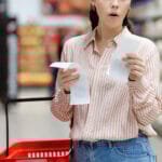 Web Banner Of Shopping And High Price. Amazement Caucasian Woman