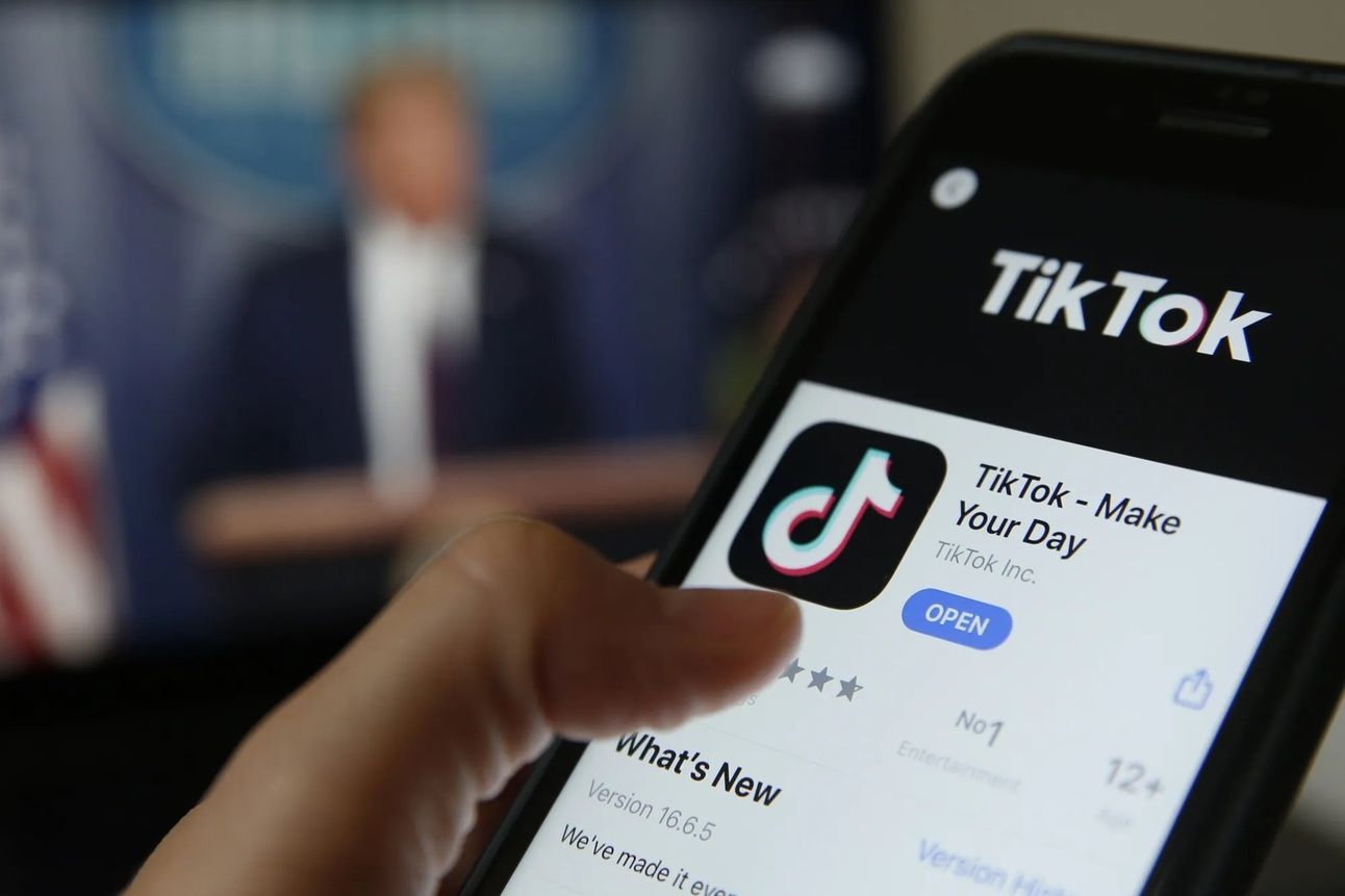 Phone shows the tiktok app