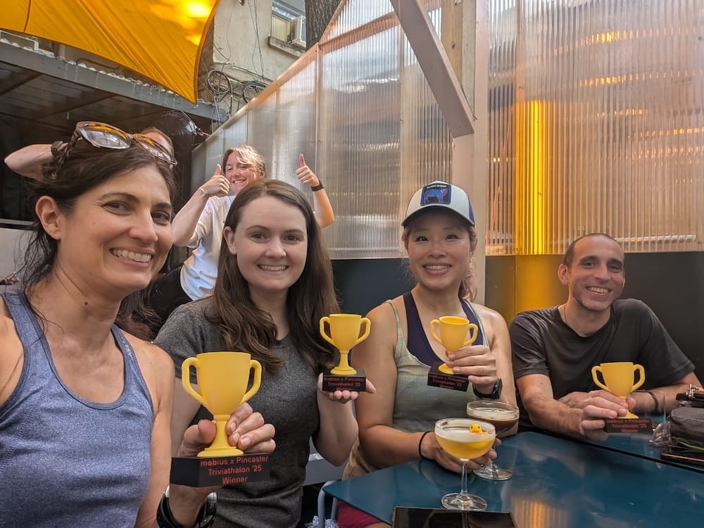 team holding trophies