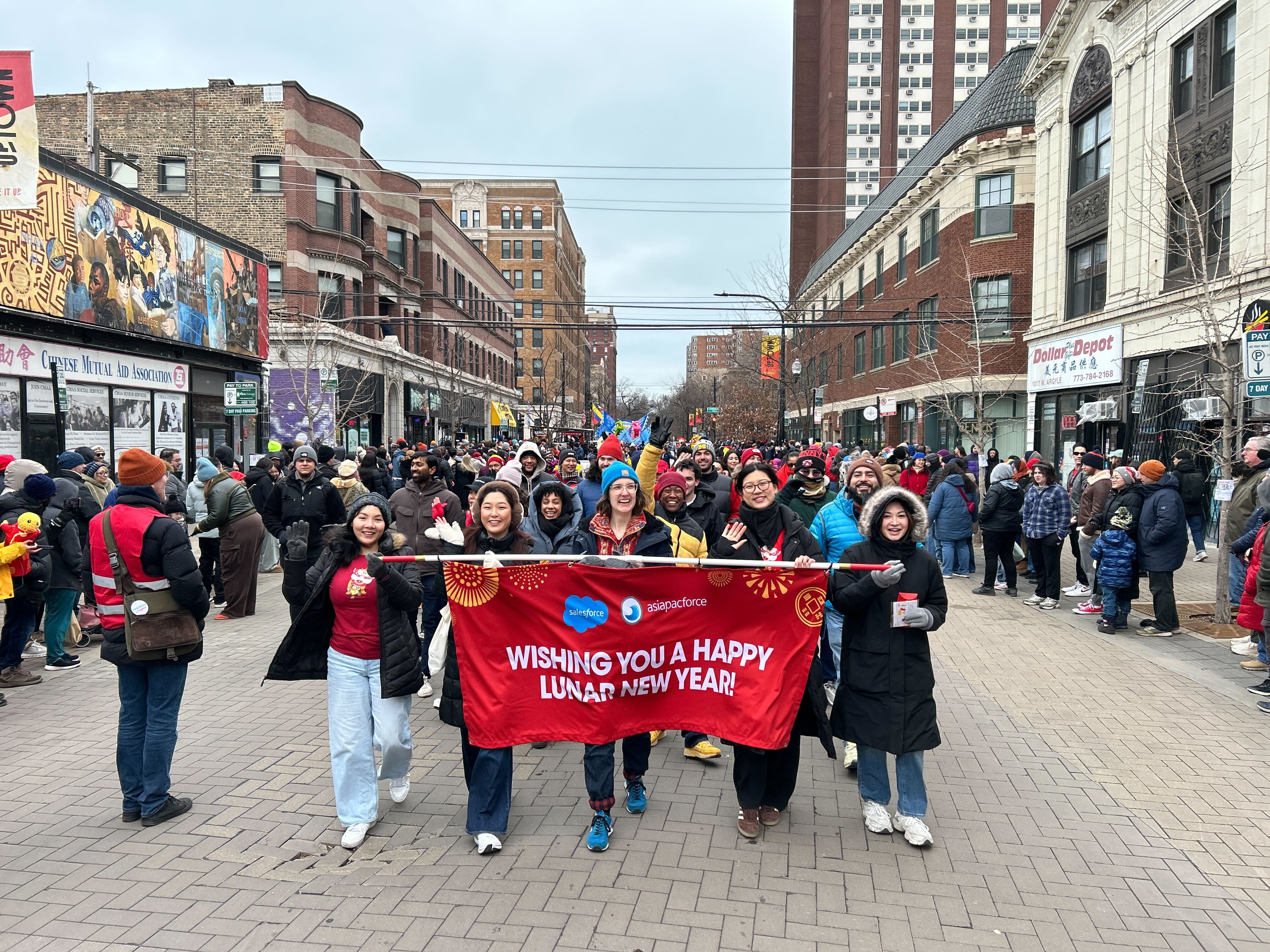 Salesforce Asian ERG members walking in the Argyle LNY Parade
