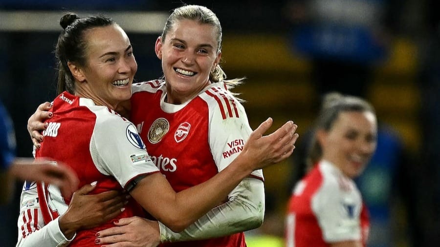 Arsenal's Australian striker #19 Caitlin Foord and Arsenal's English striker #23 Alessia Russo celebrate following the UEFA Women's Champions League Quarter Final second-leg football match 