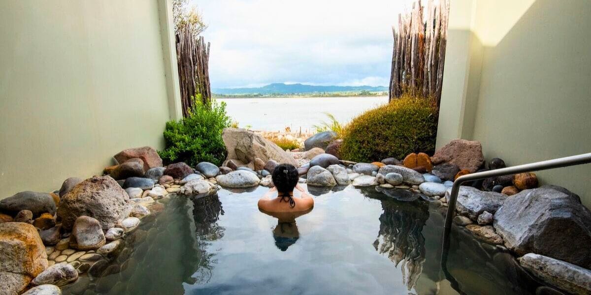 a woman in a spa pool