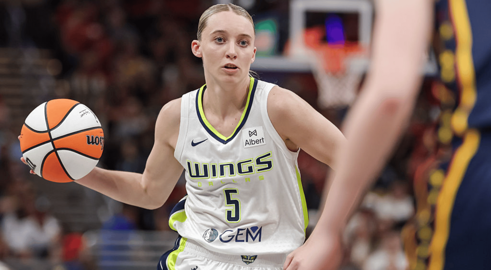 Paige Bueckers #5 of the Dallas Wings brings the ball up court during the second half