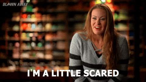 A GIF of a woman saying, "I'm a little scared."