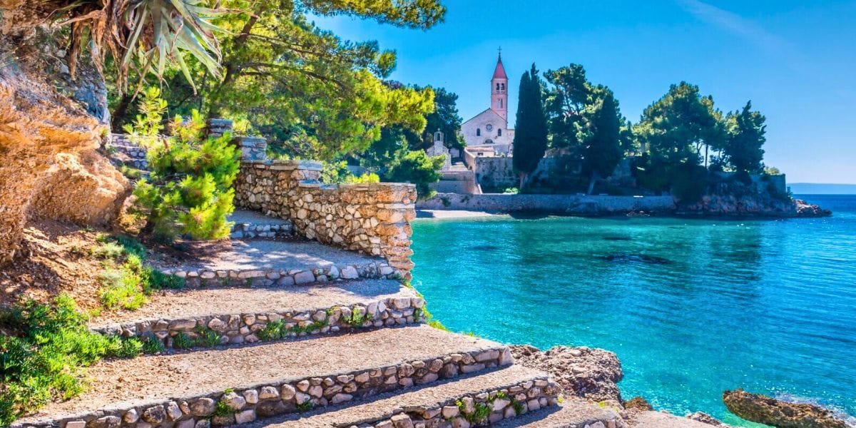 Brač, Croatia, steps that lead into beautiful water