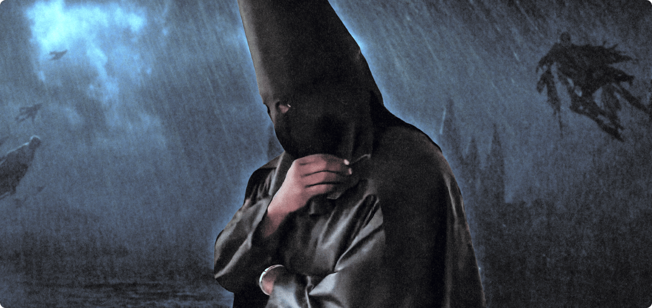 Ye in a black hood