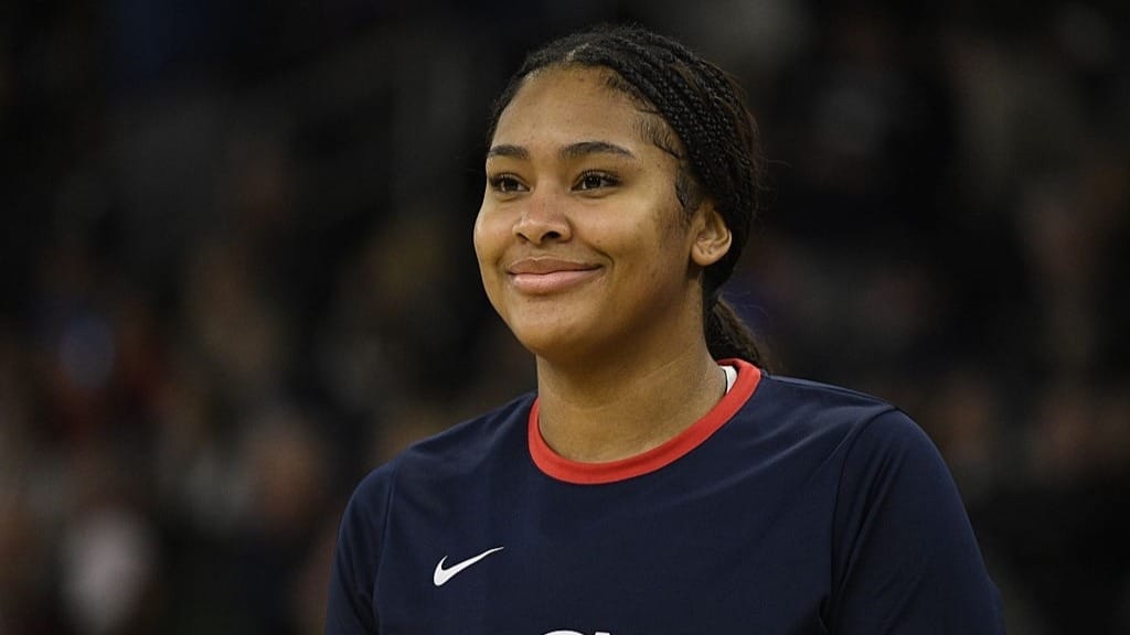 Sarah Strong #21 of the UConn Huskies smiles during halftime of the women's college basketball game between the UConn Huskies and the Providence College Friars 