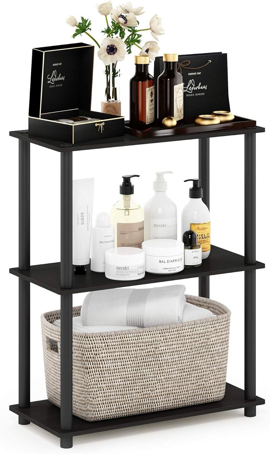 Furinno 3-Tier Turn-N-Tube Shelf – A small, three-tier black shelving unit in a compact space, holding books, plants, and candles. The easy assembly tube system is visible, showing its minimalist, functional design.