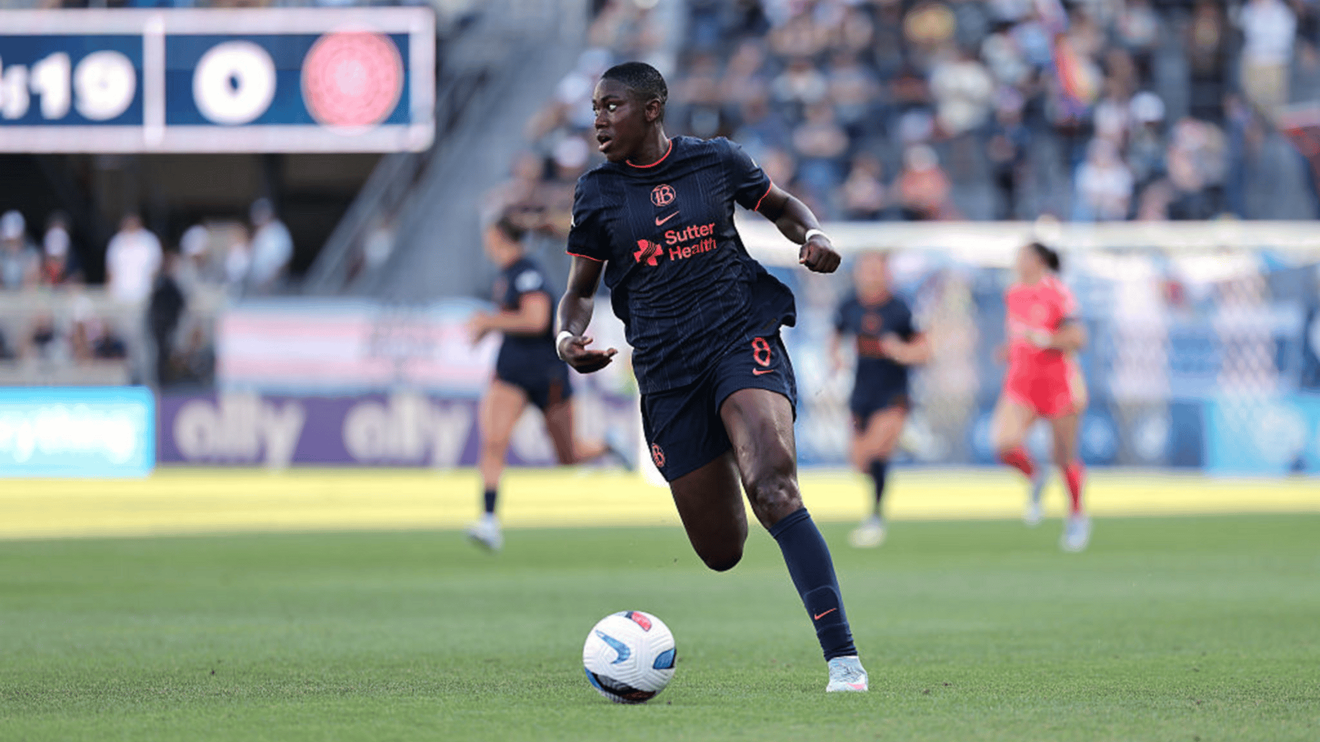 Asisat Oshoala #8 of Bay FC runs with the ball during the NWSL match between Bay FC and Portland Thorns