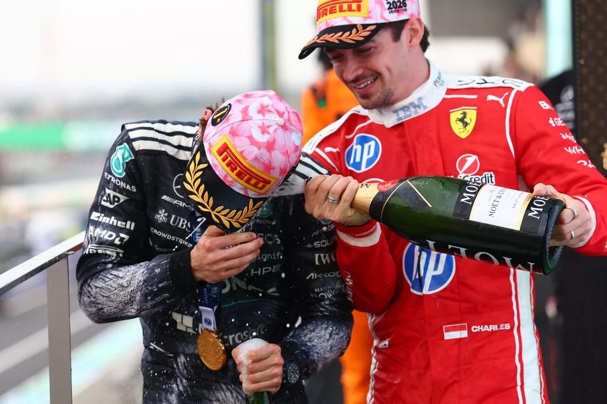 Charles Leclerc celebrating with Kimi Antonelli