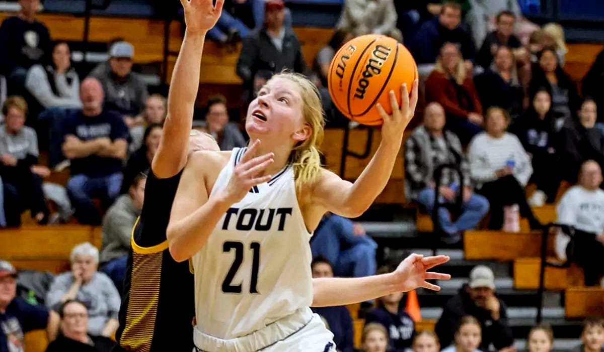 UW-Stout's Mary Berg drives for a left-handed shot.