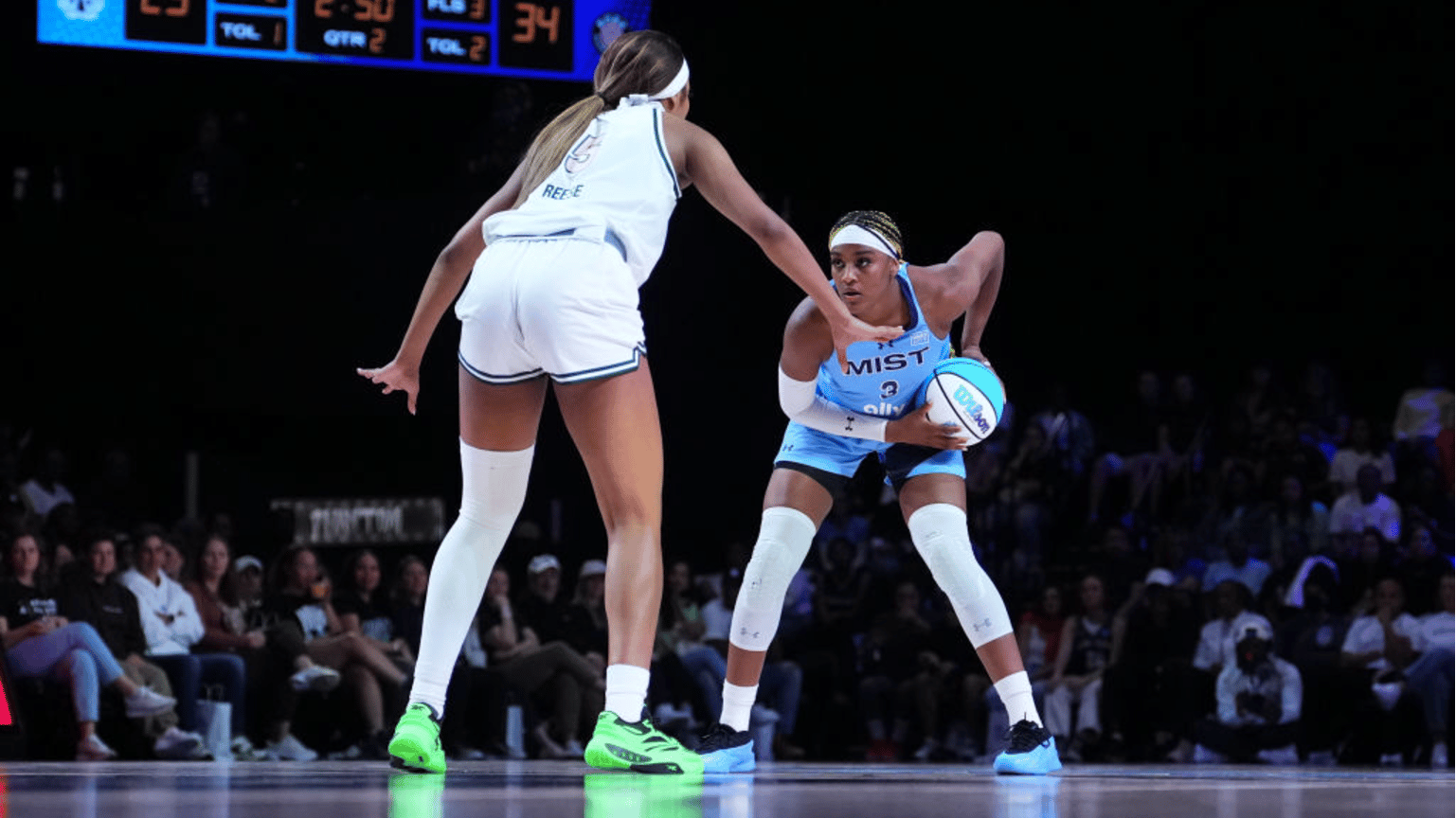 Aaliyah Edwards #3 of the Mist controls the ball against Angel Reese #5 of Rose during the second quarter at Wayfair Arena on February 07, 2025 in Medley, Florida.