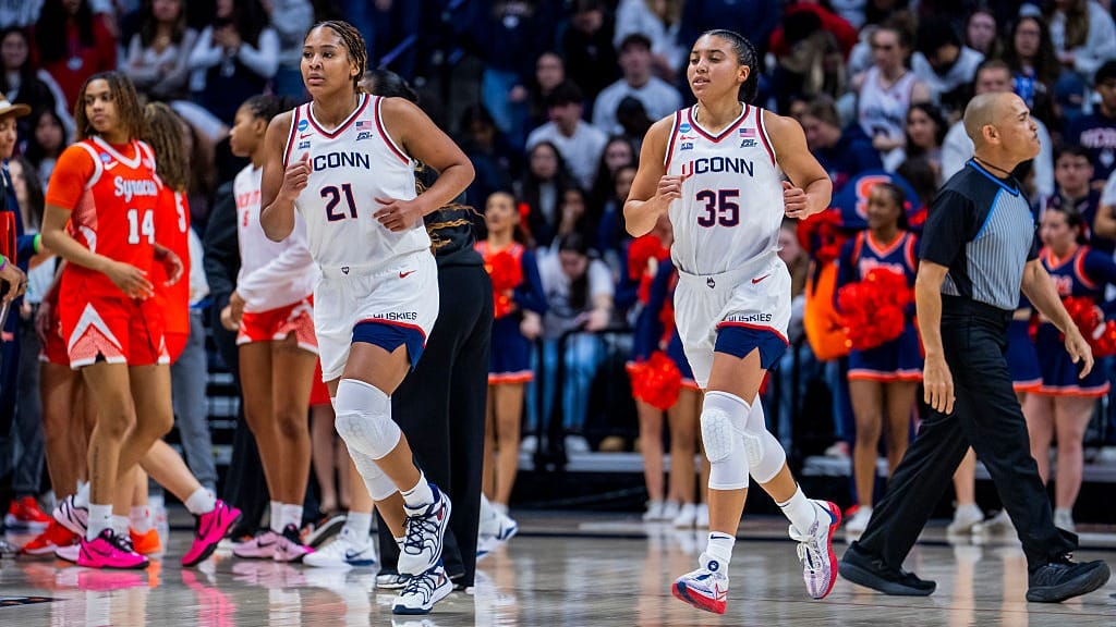 Sarah Strong #21 and Azzi Fudd #35 of the Connecticut Huskies play against the Syracuse Orange during the second half in the second round of the 2026 NCAA Women's Basketball Tournament. 