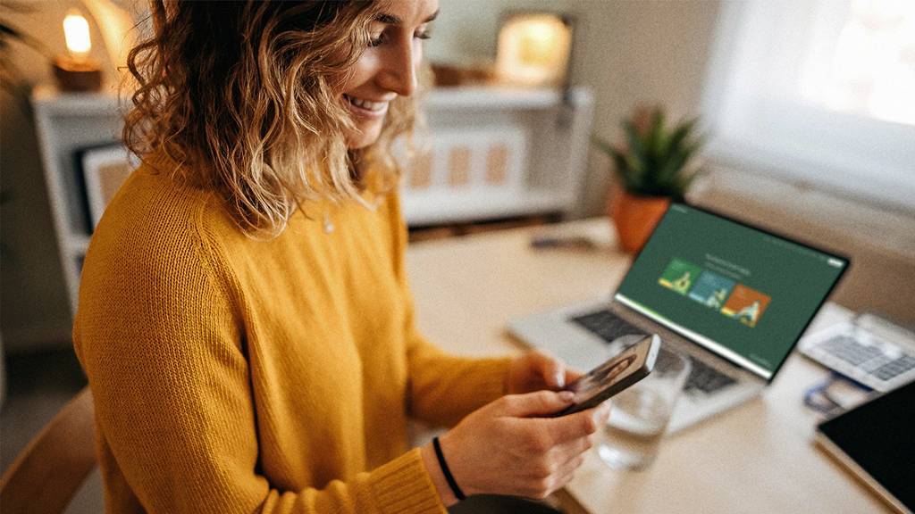 A woman looking at her phone.