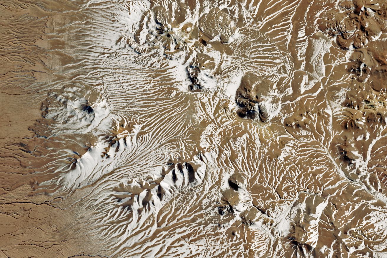 A rare snowstorm blanketed Chile’s high-altitude Atacama Desert on June 25, disrupting operations at the ALMA Observatory and revealing the region’s vulnerability to shifting atmospheric patterns. Triggered by a cold-core cutoff low, the event marked the first significant snowfall in over a decade. Satellite imagery showed rapid sublimation, the transformation of snow directly into a gas, due to extreme solar irradiance, underscoring the desert’s unique climate dynamics. The incident highlights how even the driest places on Earth are not immune to episodic weather extremes driven by broader climatic variability. 