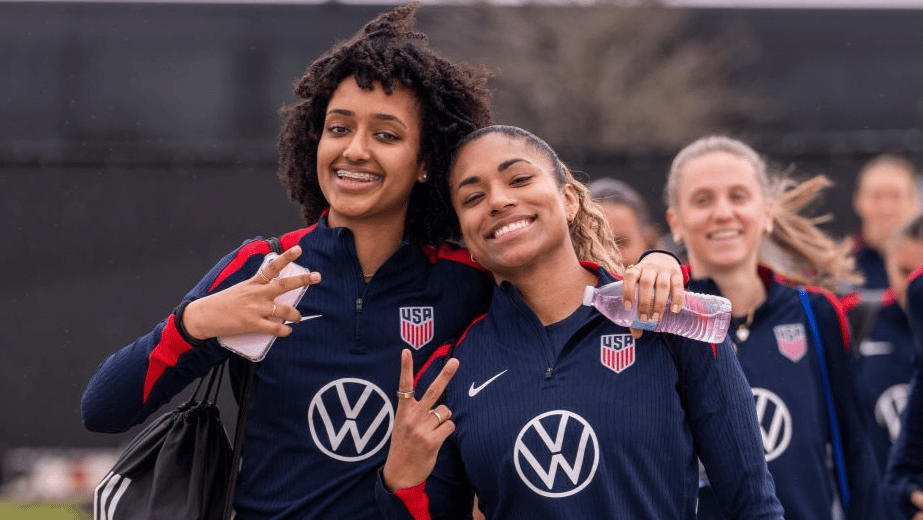 Lily Yohannes and Catarina Macario of the United States arrive at the field during USWNT training