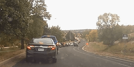 East Rockrimmon traffic at a standstill just east of Delmonico during paving