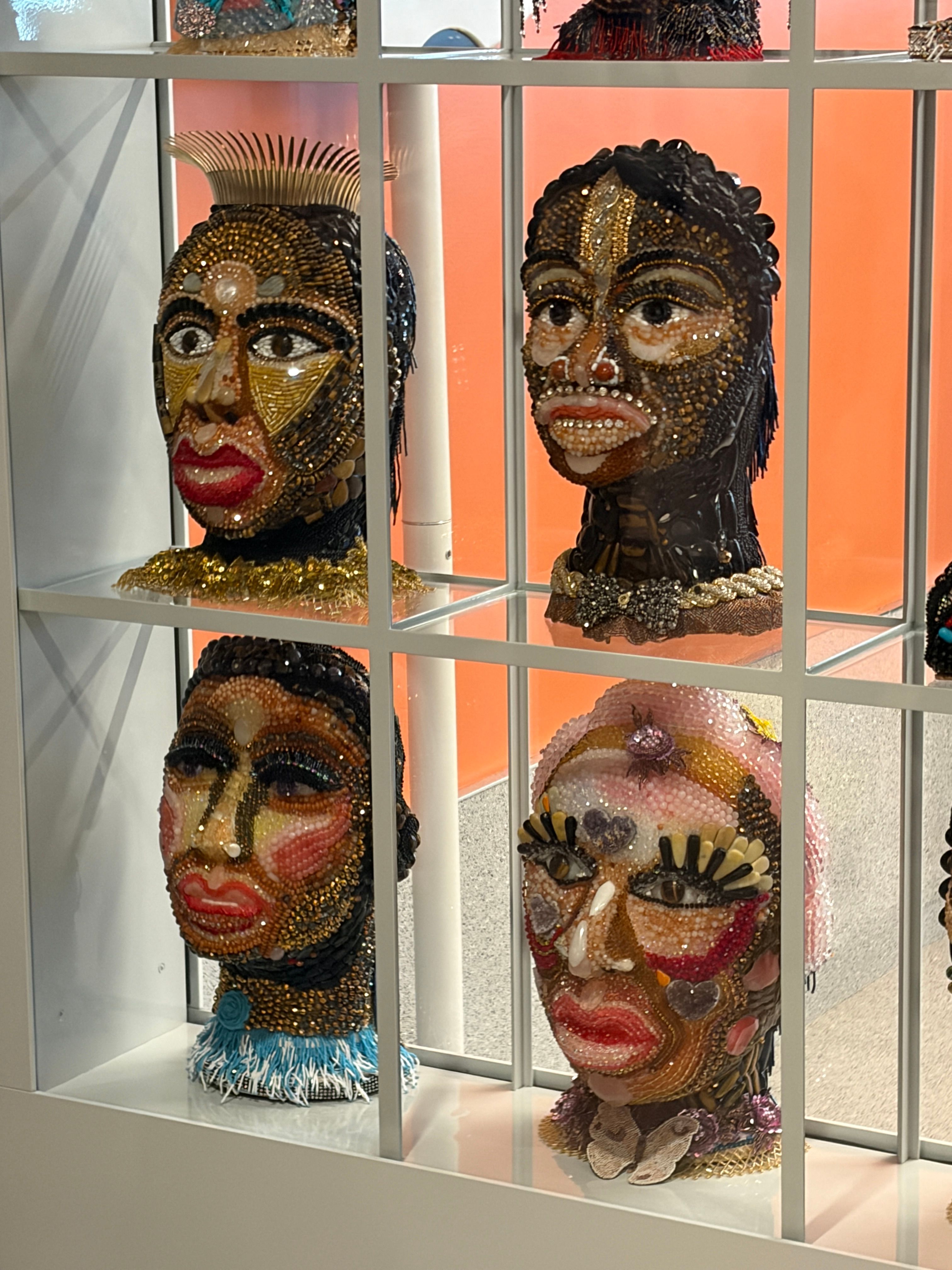 4 portrait busts made of beads, minerals and gems