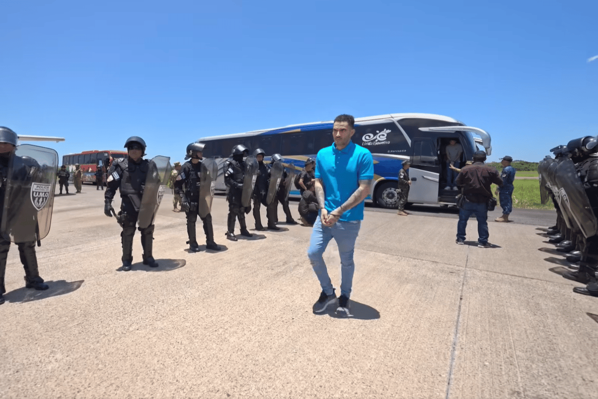 Venezuelan detainees are shown being sent home in a prison exchange for Americans held in Venezuela. Still from video by El Salvador’s government