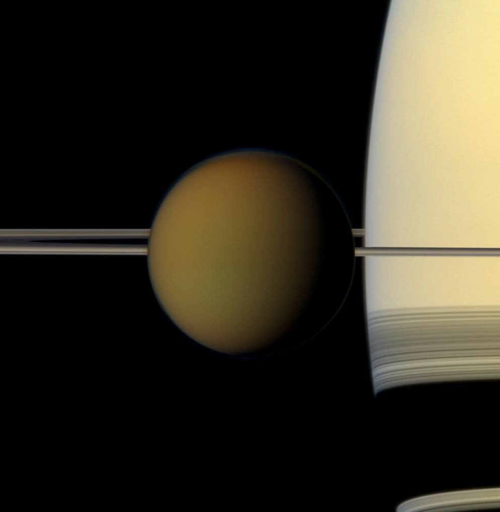 Titan passes in front of Saturn in this image from NASA's Cassini spacecraft.