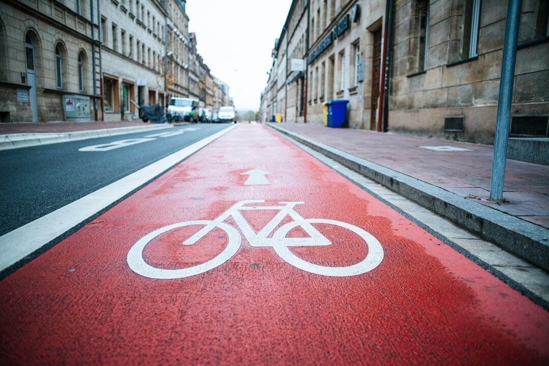 Bike lane – bicycle street. Made with analog vintage lens, Leica Elmarit-R 2.8 28mm (Year: 1977)