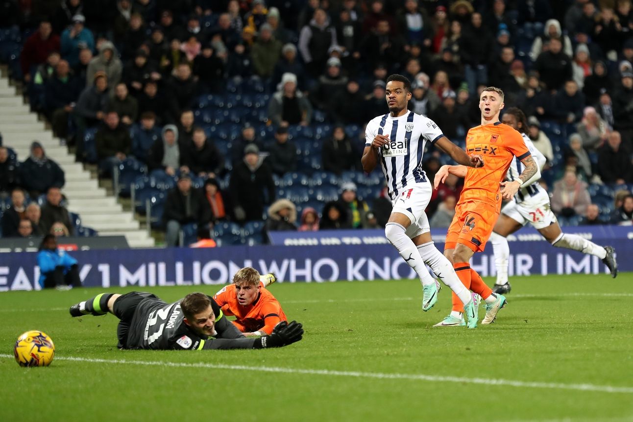 Ipswich's players watch with dismay as Grady Diangana makes it 2-0 to West Brom