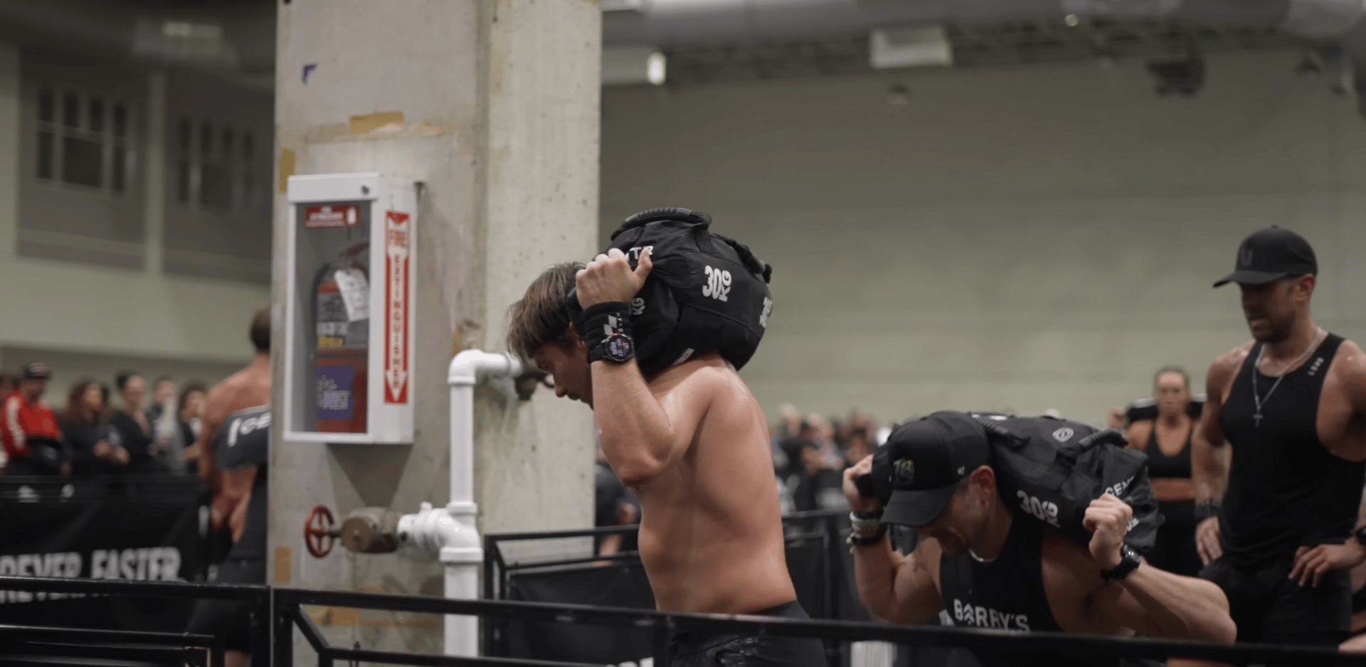 some carrying sandbag weights