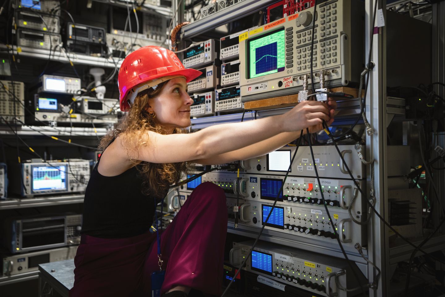 Physicist Barbara Latacz working in the BASE experiment.