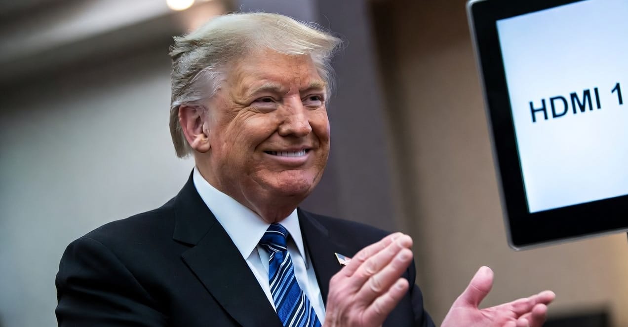 Trump clapping in front of a TV screen