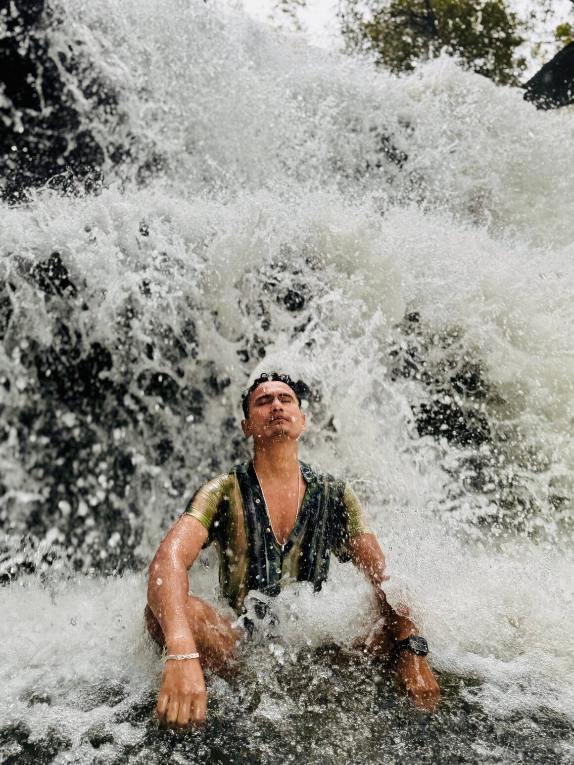 Get shower at Kbal Chhay Waterfall, Cambodia