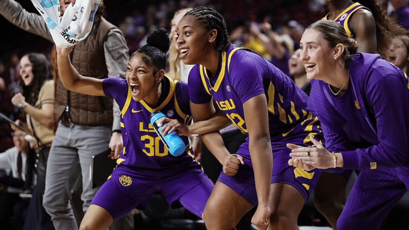 Members of the LSU Tigers cheer during the second half against the Texas A&M Aggies at Reed Arena