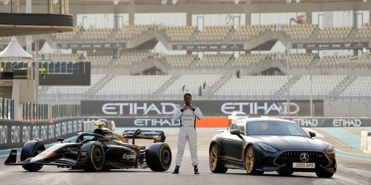 F1 racer by two cars