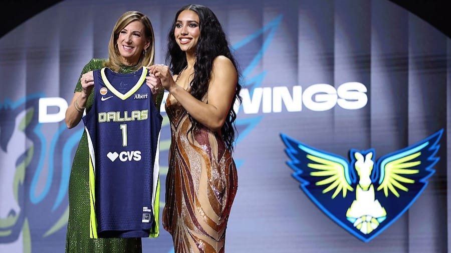 WNBA Commissioner Cathy Engelbert poses for a photo with Azzi Fudd after being drafted first overall by the Dallas Wings during the 2026 WNBA draft 