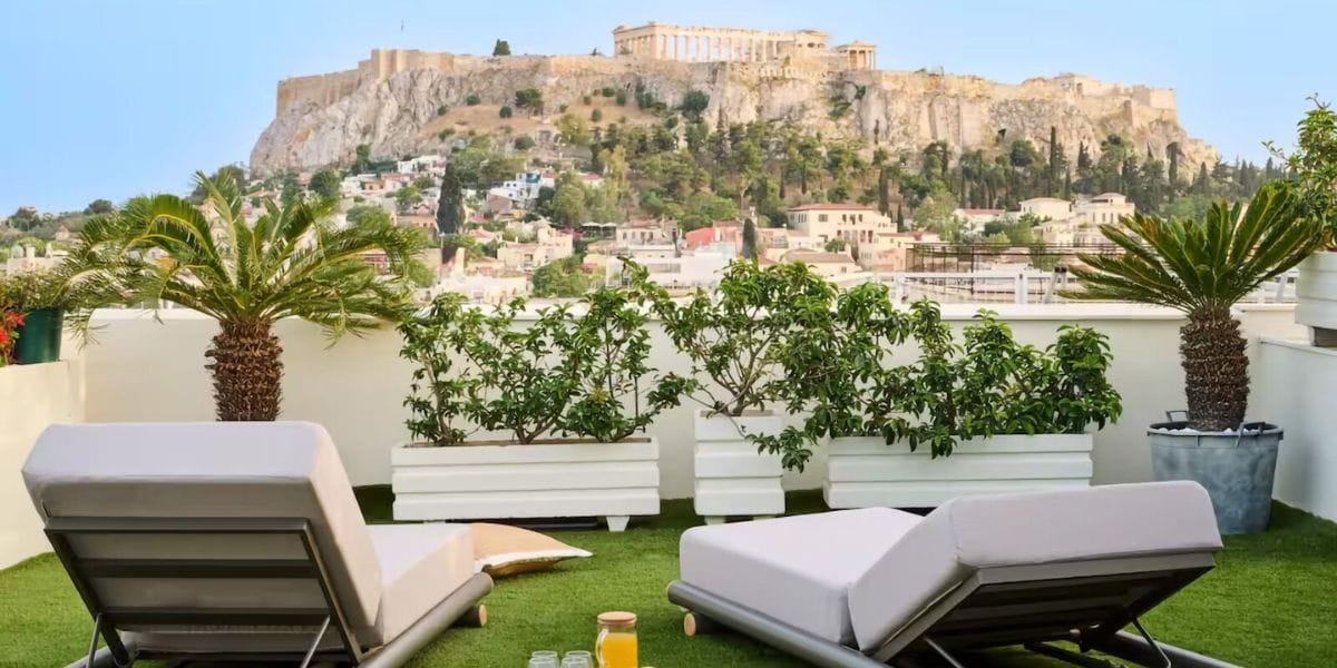 view of the Acropolis of Athens from Airbnb loungers