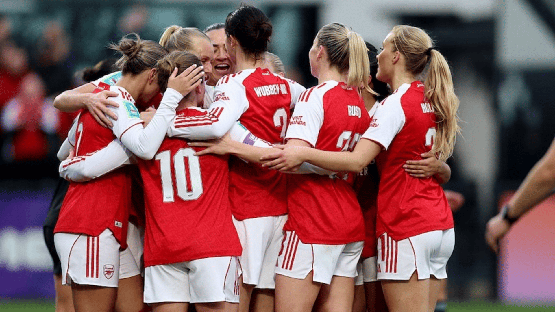 Arsenal's Kim Little (second left) celebrates with her team mates after scoring her sides second goal during the Women's FA Cup