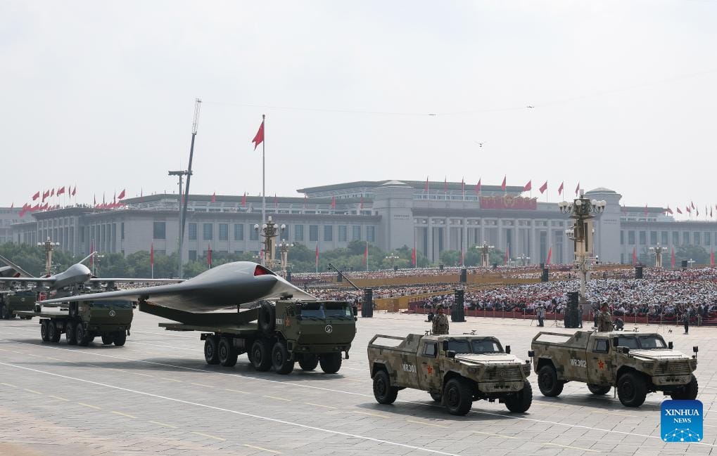 A stealth aircraft is highlighted as part of China's military parade. (Credit: Xinhua/Chen Cheng)
