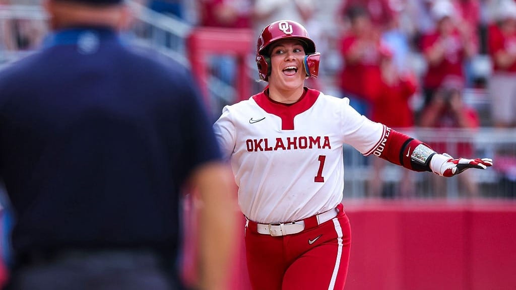 Oklahoma Sooner catcher Kendall Wells (1) celebrates her SEC record breaking 27th home run of the season as she heads to home plate during the college softball game 