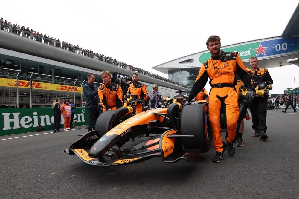 McLaren team and car on grid