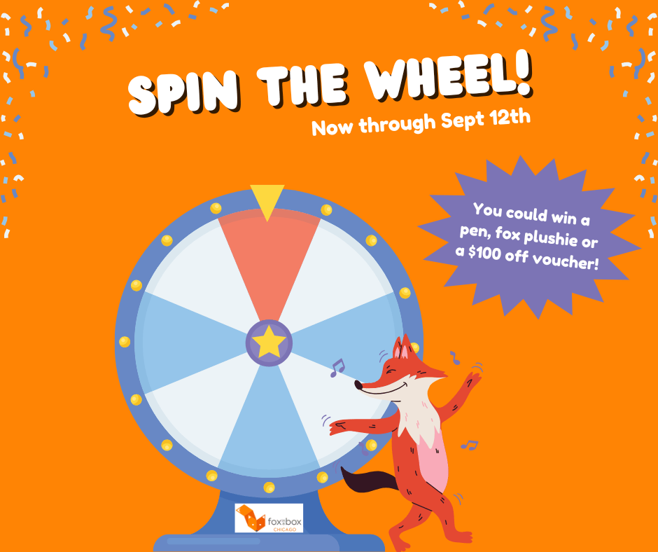 An orange background with a blue and purple prize wheel in the center. Text on the image reads “spin the wheel now through Sept 12th” and “You could win a pen, fox plushie or a $100 off voucher.”