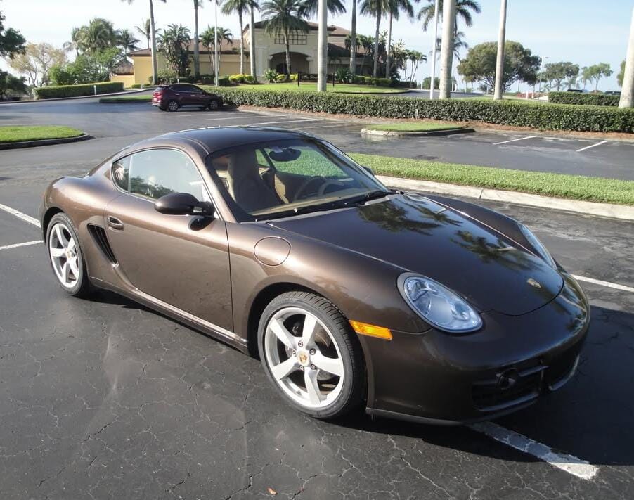 Macadamia Brown Metallic 2008 Porsche 987.1 Cayman with 63,000 miles and a single owner since new, listed for $24,000 in Naples, FL.
