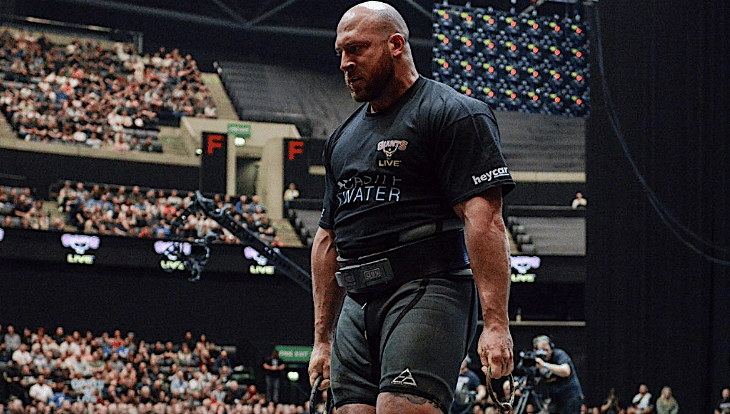 Strongman carries Nicol Stones at the World Tour Finals