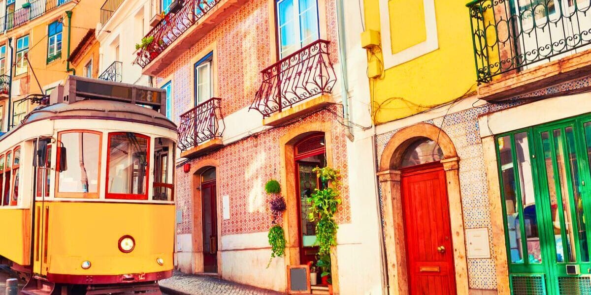 Bright, cozy Lisbon Airbnb with patterned tiles, natural light, and views of the historic city center