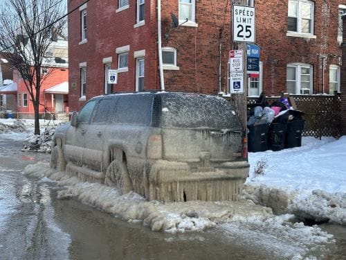 car frozen in ice on the street