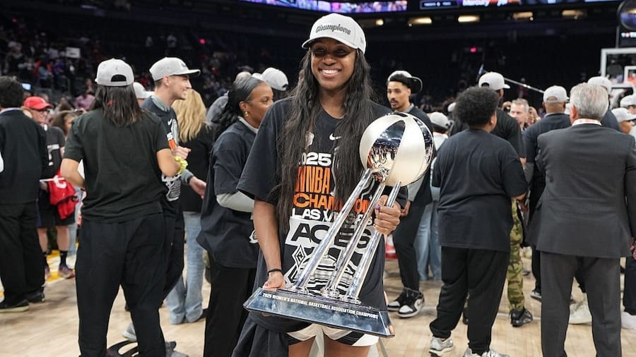 Jackie Young #0 of the Las Vegas Aces poses for a photo with the 2025 WNBA Championship trophy after the game against the Phoenix Mercury