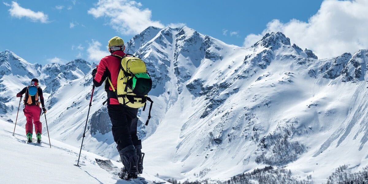 people skiing in the mountains